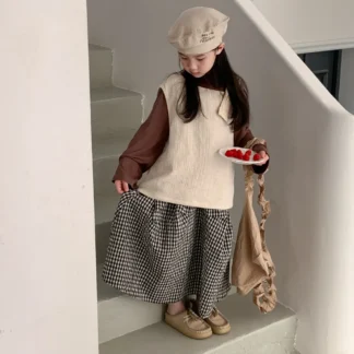 Top para niños 2024 primavera niña bebé estilo coreano falda a cuadros chaleco de dos piezas chaleco sin mangas y camisa conjunto superior de 2 piezas