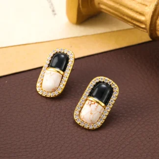 Pendientes de lujo ligeros de alta gama con personalidad de moda europea y americana