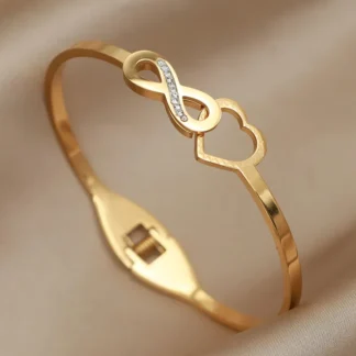 Brazaletes de corazón hueco de Metal de acero inoxidable para mujer, joyería de marca de moda, accesorios de brazaletes giratorios