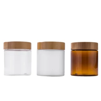 Crema cosmética de mantequilla corporal de plástico transparente ámbar para mascotas con tapa de bambú Embalaje tarro de crema cosmética de plástico para mascotas ámbar esmerilado transparente