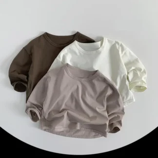 2025 primavera nuevos niños camisetas de manga larga sólido Simple niños camisetas sueltas de algodón niñas camisas de fondo versátiles ropa para niños
