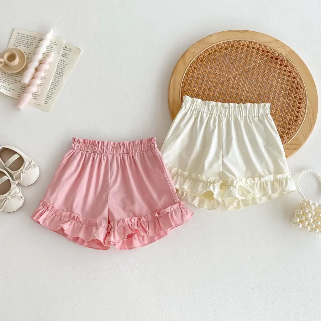 Ropa para niños, pantalones cortos finos de algodón puro para niñas, pantalones calientes versátiles con borde con volantes de color sólido para bebés