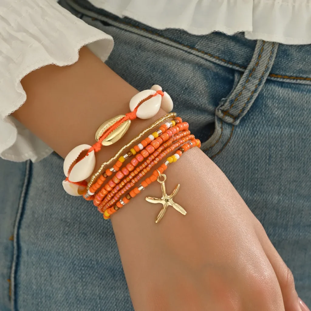 Conjunto de pulseras bohemias de siete piezas para mujer de verano, diseño tejido de cuentas de concha con colgante de estrella de mar, joyería de playa de moda