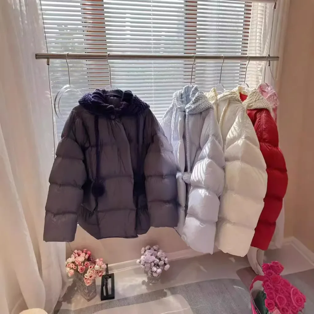 Chaqueta acolchada de lana nueva para niñas, chaqueta acolchada de longitud media gruesa de invierno con capucha, versión coreana, abrigo de moda, 2024