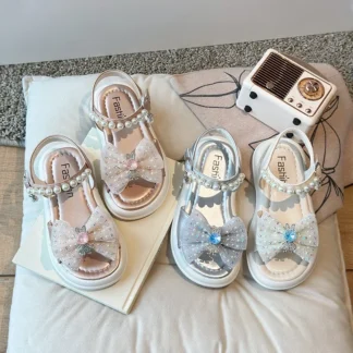 Zapatos de playa para niñas, lazo de encaje, bonito conejo de cristal, novedad de verano 2025, sandalias para niños con dedos abiertos, zapatos antideslizantes de princesa para niñas, suela suave