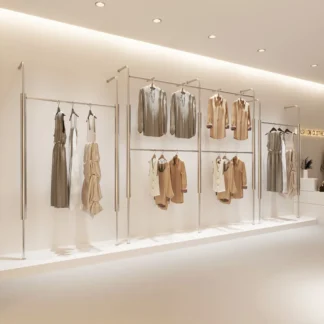 Estante de exhibición personalizado para tienda de ropa de acero inoxidable, estante de pie Simple montado en la pared, tienda de ropa para hombres de doble capa con