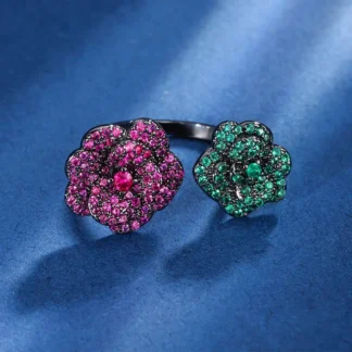 Nueva joyería de piedras preciosas de alta gama chapada en oro de 18 quilates corindón rojo oro negro flor eterna anillo personalizado joyería de mujer