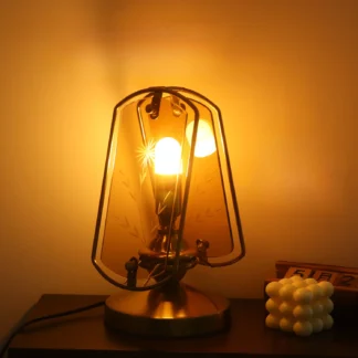 Lámpara de atmósfera nostálgica Retro creativa, luz de vela de cobre de alta gama, arte de hierro tallado de vidrio hecho a mano, decoración de escritorio