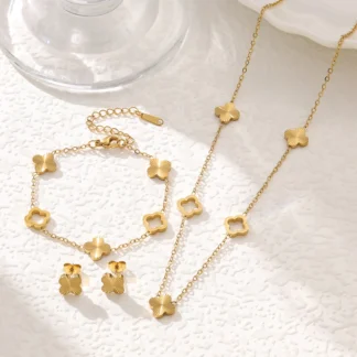 Conjunto de pendientes y collar con pulsera de trébol de cuatro hojas huecos, moderno y minimalista, hierba de la suerte con temperamento
