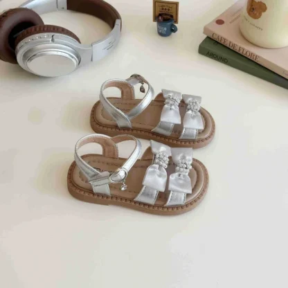 2025 Sandalias dulces para niñas, novedad de verano, moda de estilo coreano, suaves, antideslizantes, versátiles, elegantes, pajarita, zapatos de playa de princesa