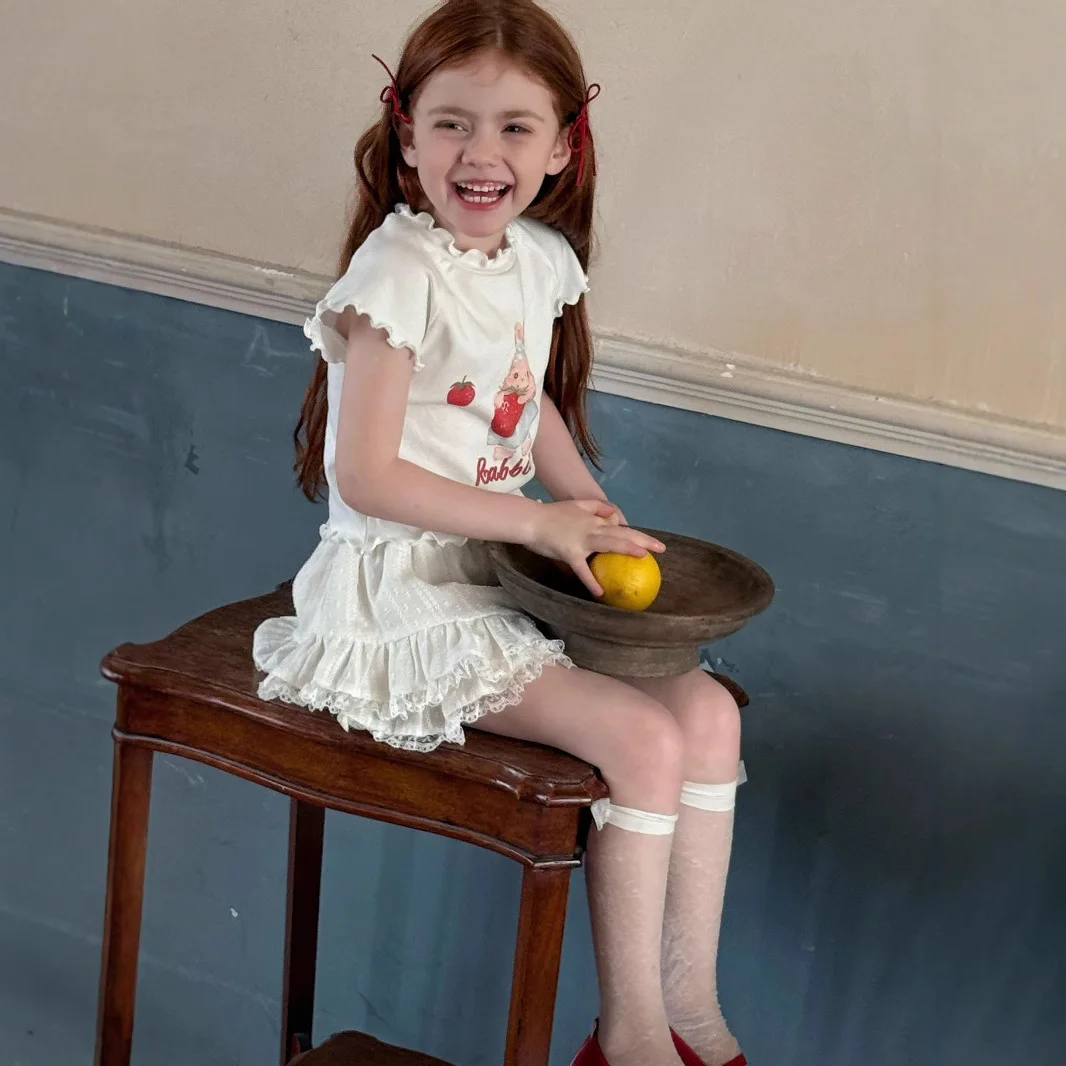 Camiseta de manga corta para niños, camisa inferior de algodón coreano, Top de verano con volantes, novedad de verano 2025