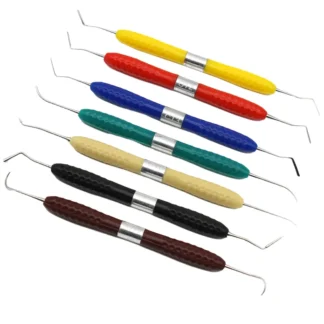 Herramientas dentales, relleno de resina Dental, cuchillo de restauración estética, mango de silicona, equipo de reparación de llenado compuesto, espátula