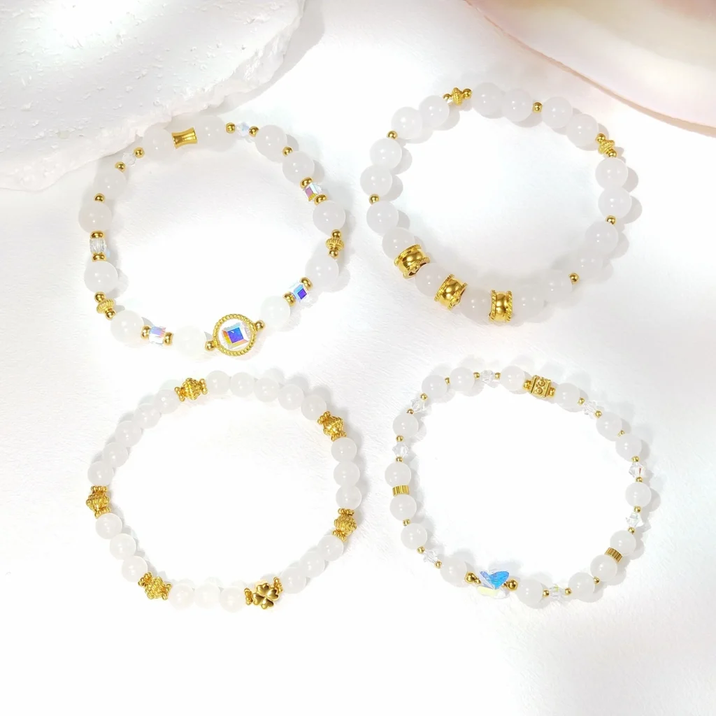 Lii Ji Pulsera elástica de acero inoxidable dorado de 6/8 mm de jade blanco natural