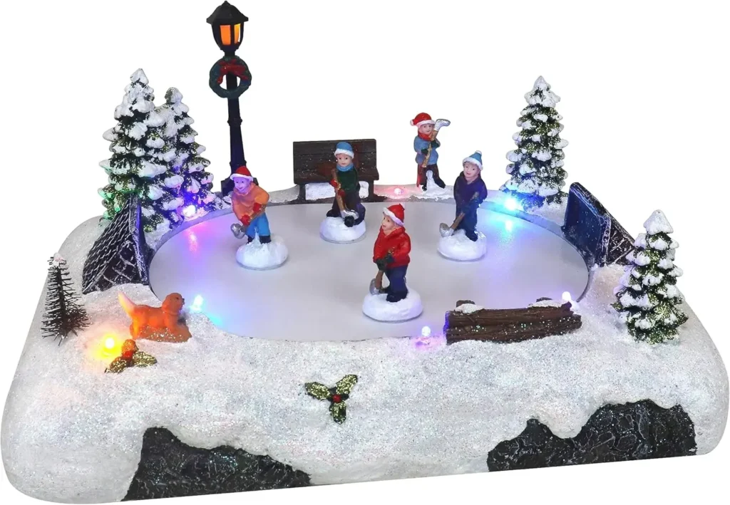 Pizarra de patinaje de Hockey de mesa de pueblo navideño musical animado con nieve preiluminada, centro de mesa perfecto para decoración del hogar en interiores