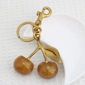 Adorno colgante de cereza dorada brillante para bolso, bolsos de hombro, llavero para bolso de mujer, accesorio festivo de Navidad