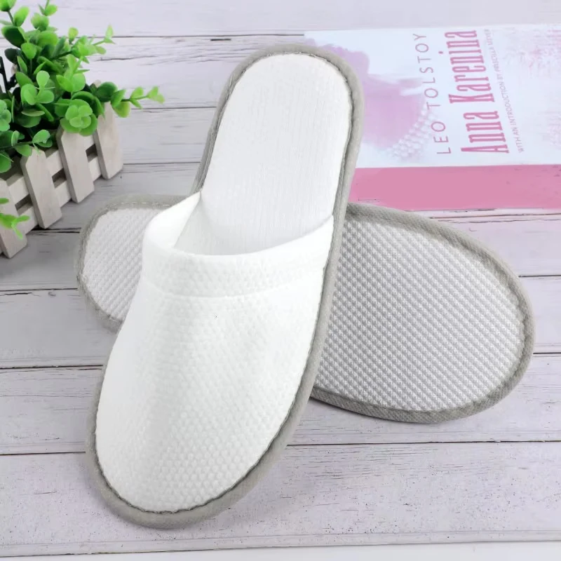 Zapatillas de algodón blanco para hombre y mujer, toboganes desechables para Hotel, sandalias de viaje para el hogar, calzado de hospitalidad, talla única, a la venta