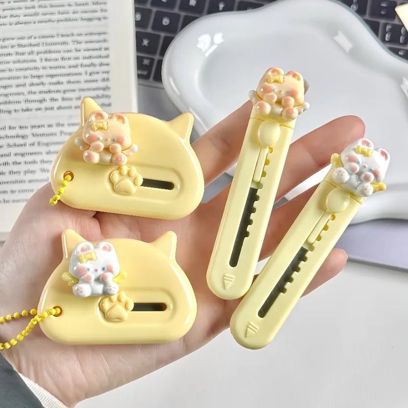 Mini cortador de caja de gatito amarillo, abridor de cartas de gato con alas de dibujos animados Kawaii, cuchillo de utilidad portátil para álbum de recortes, suministros para estudiantes